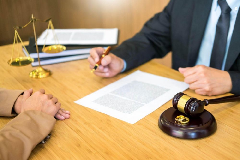 Two people at a table during Texas divorce