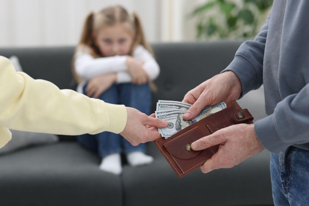 Man giving money to a woman, likely representing