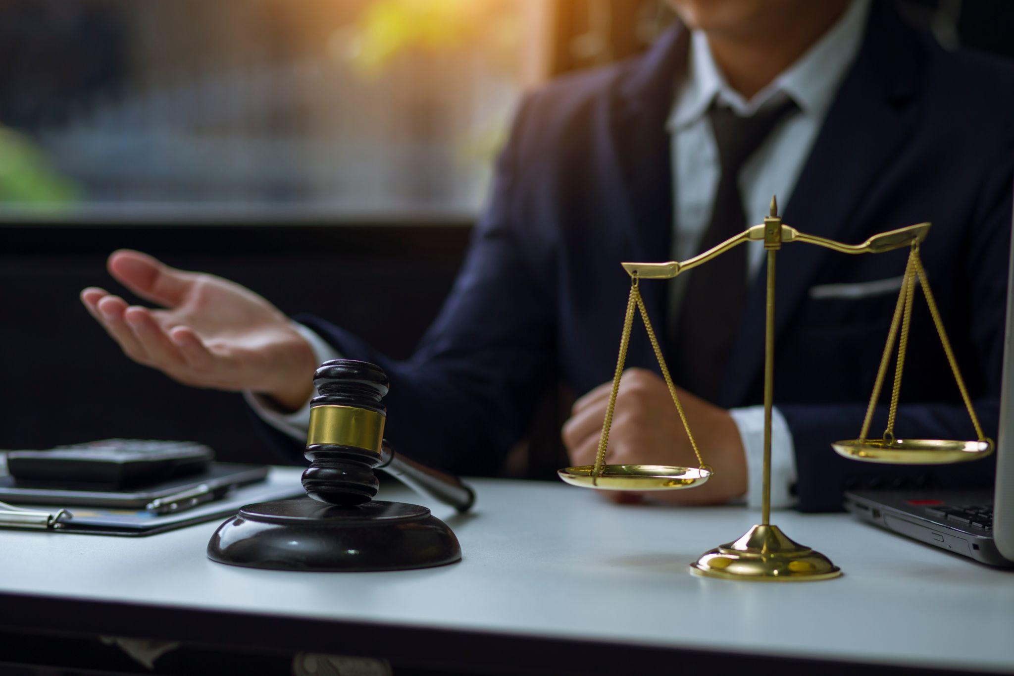 Texas child custody lawyer at desk with scales